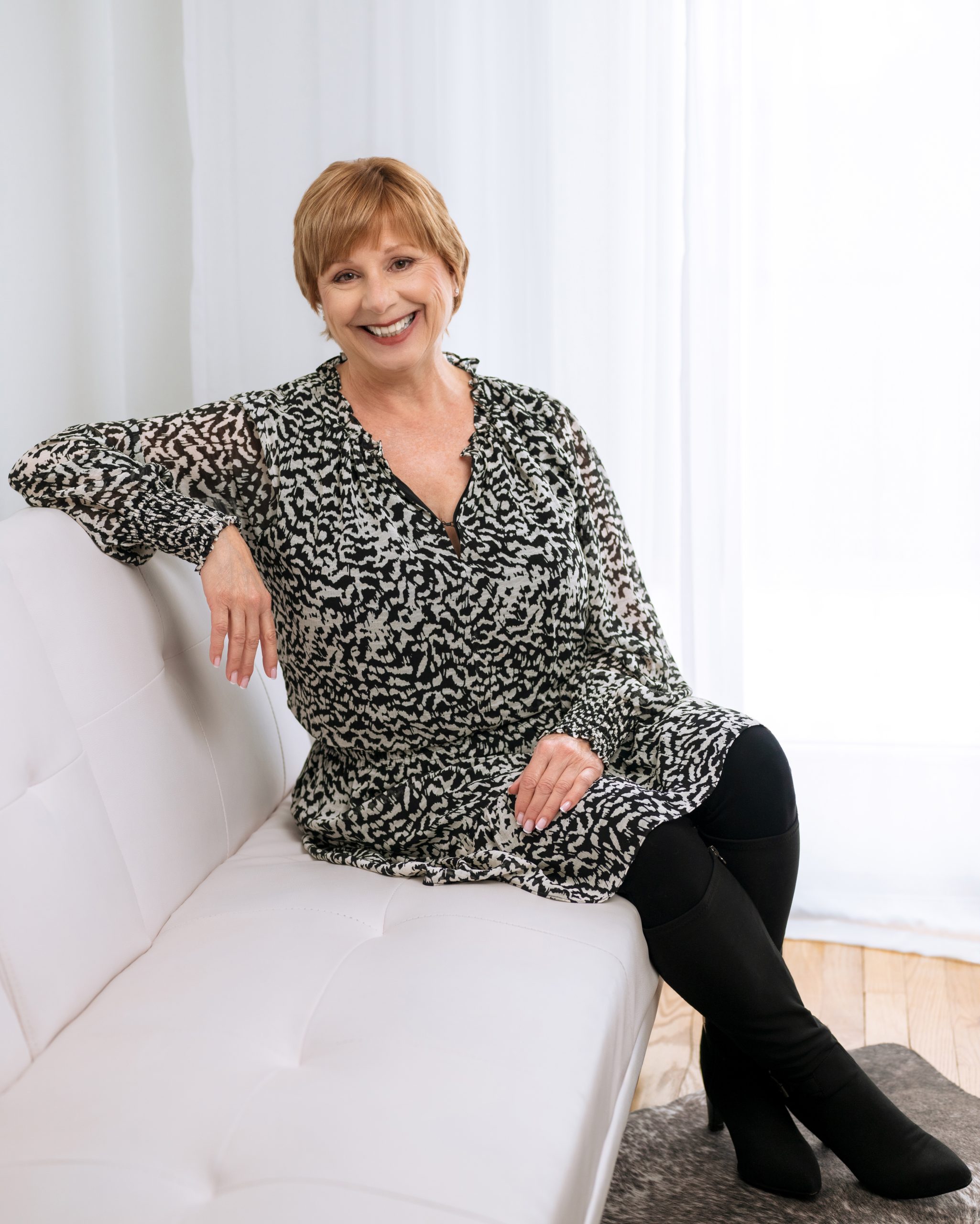 Different backdrops, outfit changes for womens headshot in studio